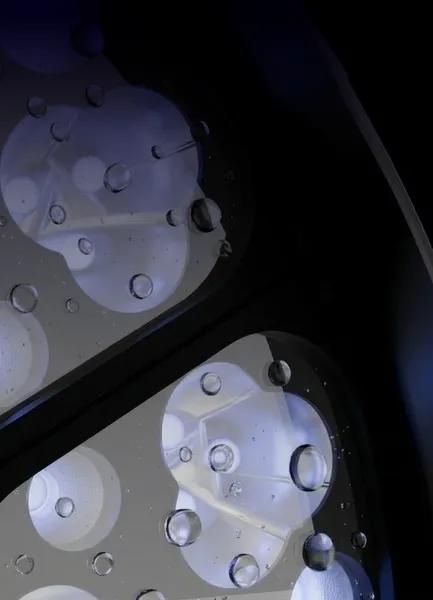 Close-up of SuperSpectral Core sapphire protective glass with water droplets, designed to protect forensic light sources during daily crime scene and laboratory use.