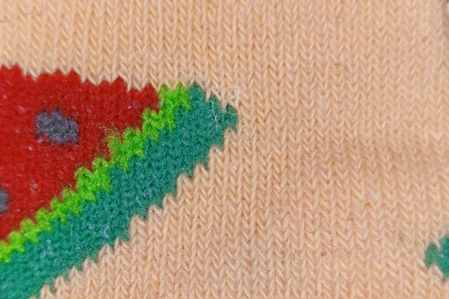 Visible-light view of multicolored fabric examined for a semen stain using the SAFE Pro 3 forensic imaging system.